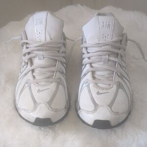 Nike Silver and White Athletic Shoes with Dynamic Design